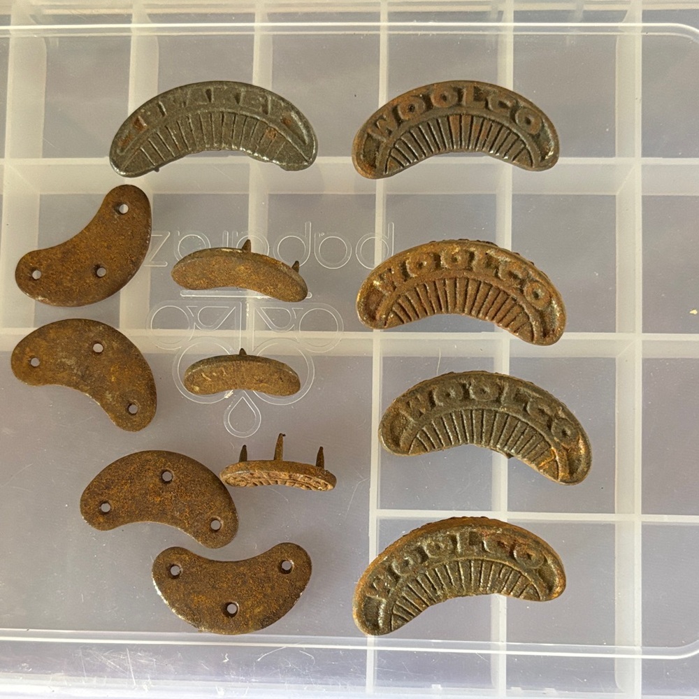 12 Vtg iron toe plates, Blakely and Woolco heel plates all are rusty see pics